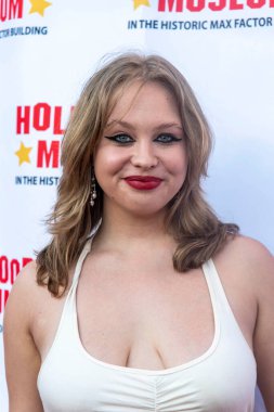 Olivia Deeble attends New Exhibit Opening Celebrating The 100th Anniversary Of Hal Roachs 