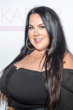 Amber Rose Johnson attends  Manna Kadar Celebrity Pink Carpet Celebrating BAZAAR Cover Release 2022 at Hotel Laguna, Laguna Beach, CA on August 9, 2022