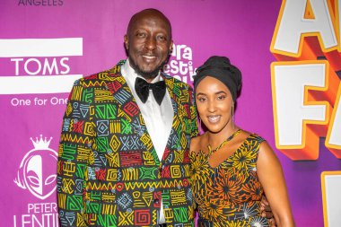 Tomas Kwaka Omolo with wife Shiela Ted attends Peter Lentini's 13th Annual Ankara Festival - Closing Night at Exchange LA, Los Angeles, CA on September 4, 2022