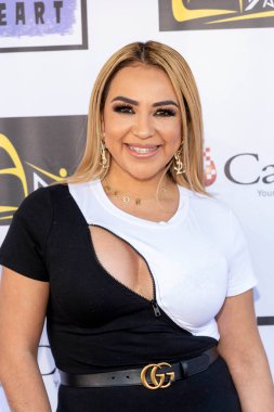 Barbara Lizzet Sanchez, 2 Ekim 2022 'de DanceFit LA, Los Angeles, CA' da Kurtis Blow eşliğinde Ava 'nın Kalp Vakfı Hip Hop Transplant Dance Party' sine katıldı.