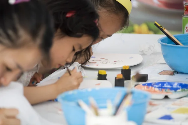 Children engaged in creative work at  Pottery Festival — Stock Photo, Image