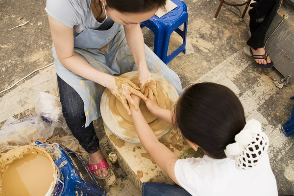 Children engaged in creative work at  Pottery Festival — Stock Photo, Image