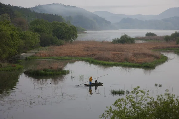 Fisherman on the river — Stock Photo, Image