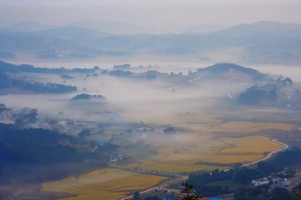 Clouds over landscape — Stock Photo, Image