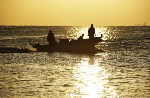 Fishermen floating on the sea — Stock Photo, Image