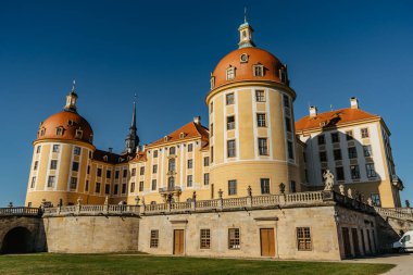 View of fairy tale Moritzburg Castle in Saxony,Germany.Magnificent baroque palace in middle of large pond and park.Popular location for Czech fairy tale movie Three Nuts for Cinderella