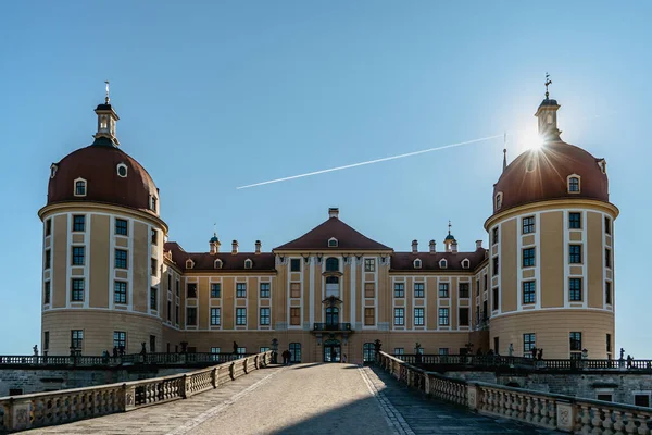 View of fairy tale Moritzburg Castle in Saxony,Germany.Magnificent baroque palace in middle of large pond and park.Popular location for Czech fairy tale movie Three Nuts for Cinderella