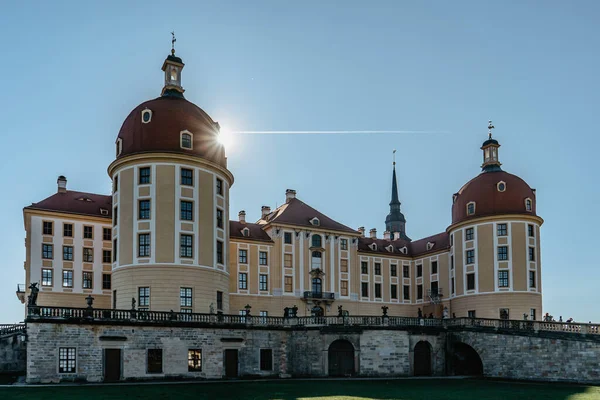 View of fairy tale Moritzburg Castle in Saxony,Germany.Magnificent baroque palace in middle of large pond and park.Popular location for Czech fairy tale movie Three Nuts for Cinderella