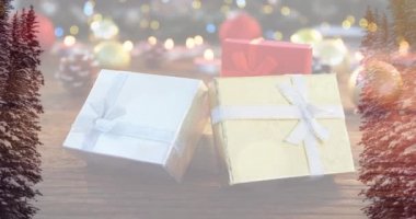 Kış manzarası ve Noel hediyelerinin videosu. Noel, gelenek ve kış kutlaması konsepti Dijital kompozit video.