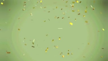Yeşil arka plana düşen altın konfetilerinin animasyonu. parti ve kutlama konsepti dijital olarak oluşturulmuş video.