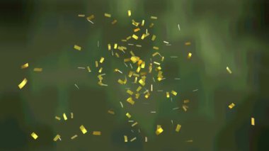 Yeşil arka plana düşen altın konfetilerinin animasyonu. parti ve kutlama konsepti dijital olarak oluşturulmuş video.