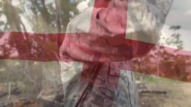 Asker yerine İngiltere bayrağının canlandırılması. küresel vatanseverlik, silahlı kuvvetler ve koruma kavramı dijital olarak oluşturulmuş video.