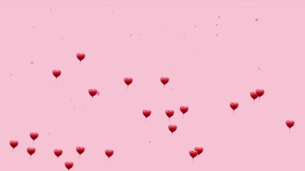 ピンクの背景に浮かぶ赤いハートのアイコンのアニメーション バレンタインデーロマンス愛の概念をデジタルで生成したビデオ — ストック動画