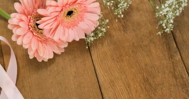 Animação Esperança Fita Rosa Círculo Sobre Mesa Com Flores Conceito — Vídeo de Stock