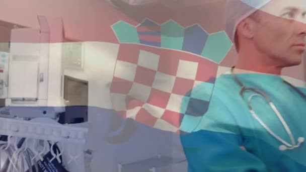 手术室里 在外科医生面前挥动着克罗地亚国旗的动画 全球医学 围产期保健服务 数码制作的19种流行病概念视频 — 图库视频影像