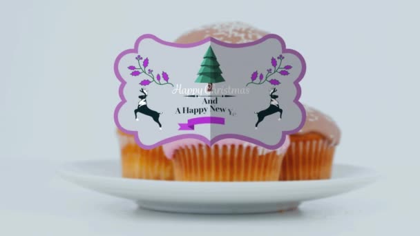 Animação Cumprimentos Natal Tag Sobre Cupcakes Fundo Branco Natal Inverno — Vídeo de Stock