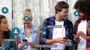 Düşen sosyal medya simgelerinin animasyonu ve akıllı telefon kullanan insanlar üzerindeki bağlantı ağı. Sosyal medya ve iletişim konsepti dijital olarak oluşturulmuş video.