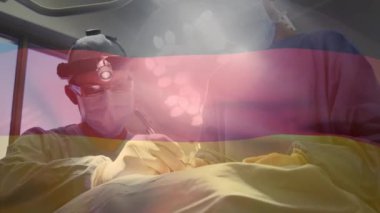 Cerrahların ameliyat odasında sallanan Alman bayrağının animasyonu. küresel tıp, covid 19 pandemik konsept sırasında sağlık hizmetleri dijital olarak üretilen video.