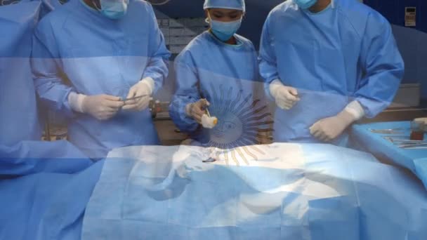 Animazione Bandiera Argentina Sventolando Sopra Chirurghi Sala Operatoria Medicina Globale — Video Stock