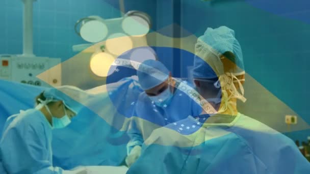 手术室里 在外科医生面前挥动着巴西国旗的动画 全球医学 围产期保健服务 数码制作的19种流行病概念视频 — 图库视频影像