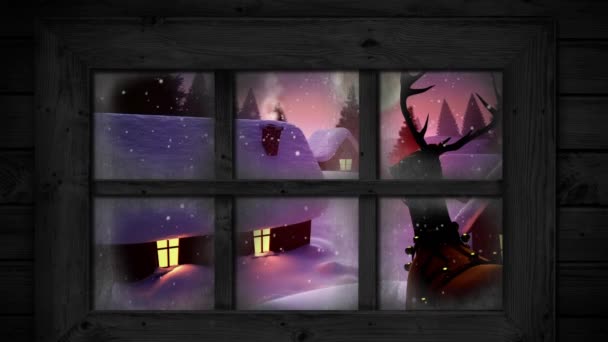 冬の風景の上に複数の家や木の上に降る雪に対する木製の窓枠 クリスマス フェスティバルとお祝いのコンセプト — ストック動画