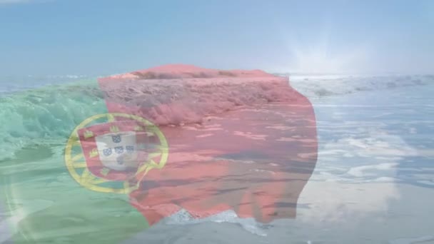 Digital Sammansättning Vifta Portugal Flagga Mot Havsvågor Stranden Nationell Turism — Stockvideo