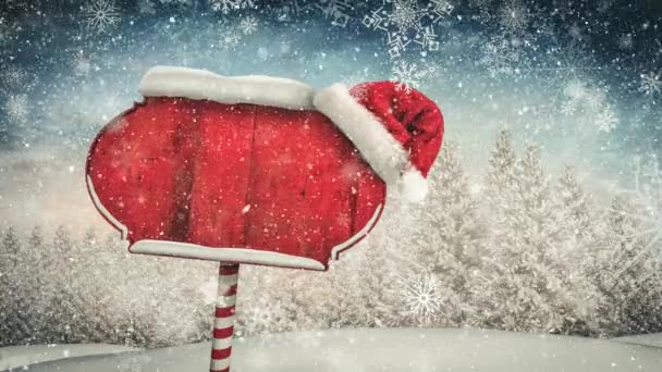 Neve Caduta Cappello Babbo Natale Sopra Cartello Rosso Legno Sul — Video Stock