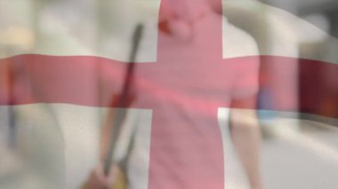 İngiltere bayrağının canlandırılması. Covid 19 salgını sırasında yüz maskesi takan adamın üzerinde sallanıyor. küresel covid 19 salgın konsepti dijital olarak oluşturulmuş video.