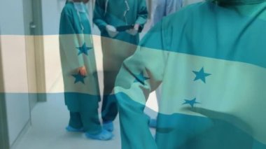 Hastane koridorundaki cerrahların üzerinde sallanan Honduras bayrağının animasyonu. küresel tıp, covid 19 pandemik konsept sırasında sağlık hizmetleri dijital olarak üretilen video.