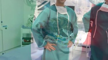 Meksika bayrağının ameliyathanede mutlu cerrahların üzerinde dalgalanması. küresel tıp, covid 19 pandemik konsept sırasında sağlık hizmetleri dijital olarak üretilen video.