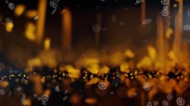 Sarı arkaplana yağan altın parıltı ve karın animasyonu. Noel, gelenek ve kutlama konsepti dijital olarak oluşturuldu.