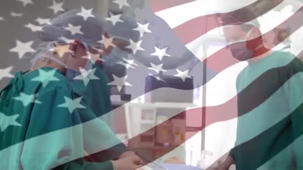 Animação Bandeira Dos Estados Unidos América Acenando Sobre Cirurgiões Teatro — Vídeo de Stock