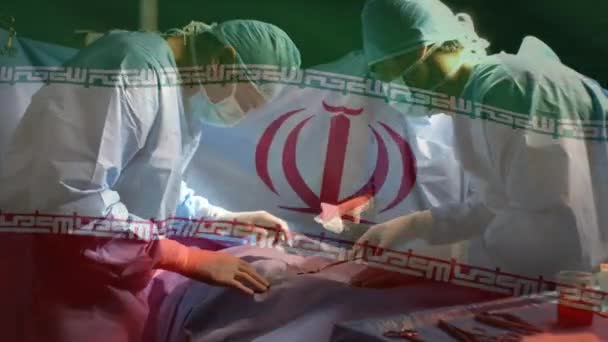 Animación Bandera Irán Ondeando Sobre Cirujanos Quirófano Medicina Global Servicios — Vídeo de stock