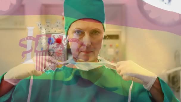 Ameliyathanede Cerrah Üzerinde Sallanan Spanya Bayrağının Animasyonu Küresel Tıp Covid — Stok video