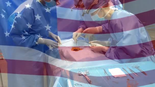 การเคล อนไหวของธงของสหร ฐอเมร กาโบกม อเหน ลยแพทย ในโรงละครปฏ การ การแพทย วโลก — วีดีโอสต็อก