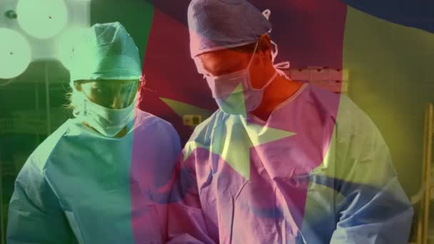 Анімація Прапора Камеруну Махає Над Хірургами Операційному Театрі Глобальна Медицина — стокове відео