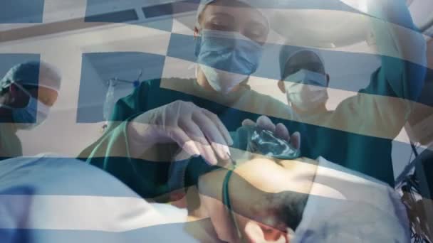 Animación Bandera Grecia Ondeando Sobre Cirujanos Quirófano Medicina Global Servicios — Vídeos de Stock