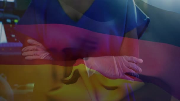 Ameliyathanede Anestezi Uzmanı Sallanan Alman Bayrağının Animasyonu Küresel Tıp Covid — Stok video