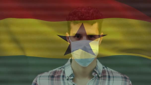 Animation Flag Ghana Waving Man Wearing Face Mask Covid Pandemic — Stock Video