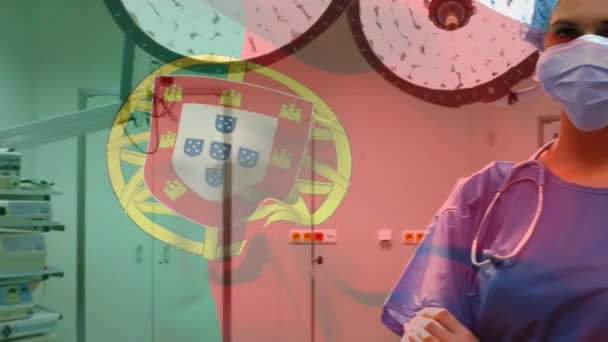 Animação Bandeira Portugal Acenando Sobre Anestesiologista Sala Operações Medicina Global — Vídeo de Stock