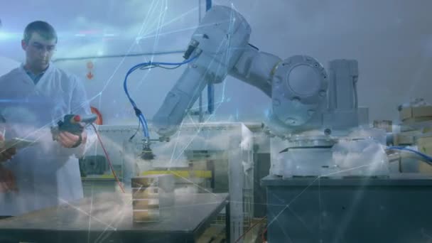 Animasi Jaringan Koneksi Atas Pria Kaukasia Yang Bekerja Pada Robot — Stok Video