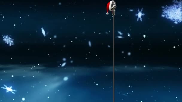 마이크 내리는 애니메이션 크리스마스 모자가 어두운 배경에 크리스마스 디지털 비디오 — 비디오