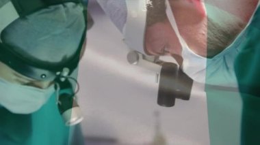Ameliyathanede cerrahlar üzerinde Nijerya bayrağının canlandırılması. küresel tıp, covid 19 pandemik konsept sırasında sağlık hizmetleri dijital olarak üretilen video.