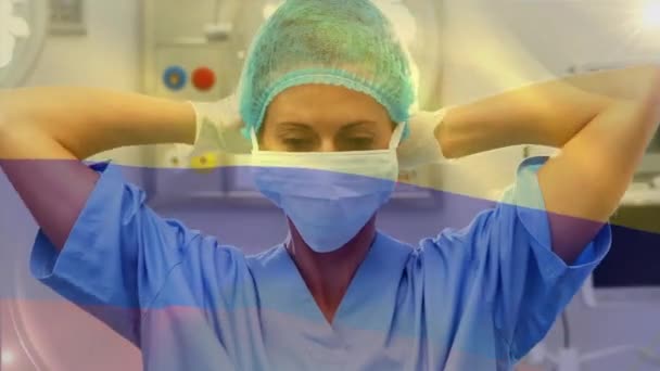 Animatie Van Vlag Van Colombië Zwaaien Chirurgen Operatiekamer Wereldwijde Geneeskunde — Stockvideo