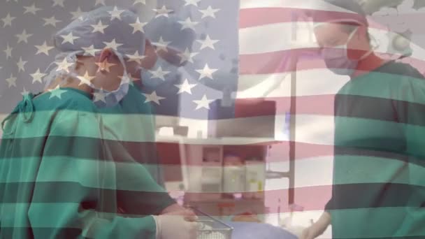 Animación Bandera Ondeando Sobre Cirujanos Quirófano Medicina Global Servicios Salud — Vídeo de stock