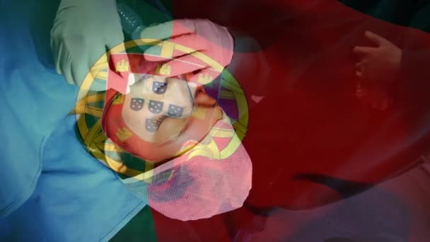 Κινούμενη Σημαία Της Πορτογαλίας Κυματίζει Πάνω Αναισθησιολόγος Στο Χειρουργείο Παγκόσμια — Αρχείο Βίντεο