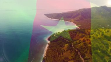 Deniz manzarasına karşı kamerun bayrağı sallamanın dijital bileşimi. Ulusal turizm ve seyahat kavramı