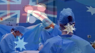 Ameliyathanede cerrahlar yerine Avustralya bayrağının canlandırılması. küresel tıp, covid 19 pandemik konsept sırasında sağlık hizmetleri dijital olarak üretilen video.