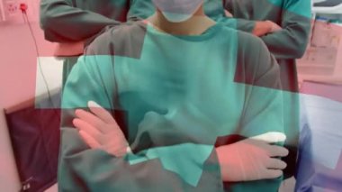 Ameliyathanede cerrahların üzerinde bayrak sallama animasyonu. küresel tıp, covid 19 pandemik konsept sırasında sağlık hizmetleri dijital olarak üretilen video.