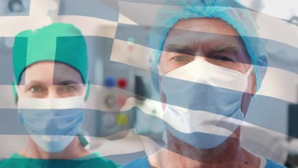 Анімація Прапора Греції Махає Над Хірургами Операційному Театрі Глобальна Медицина — стокове відео